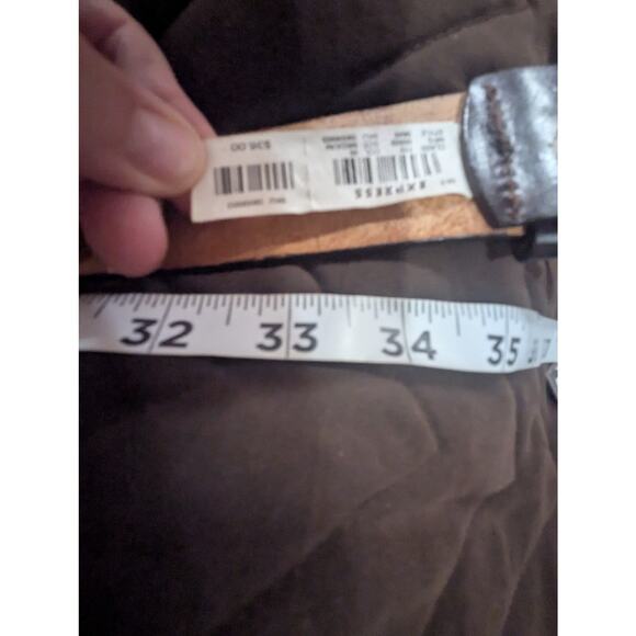 Women\'s light tan tooled leather belt w/silver hardware by Express size M (34\